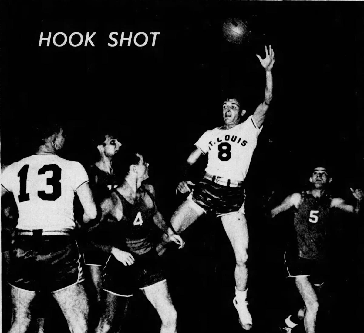 St Louis Bombers Don Putnam goes up for a hook shot in the first ever St Louis Bombers game